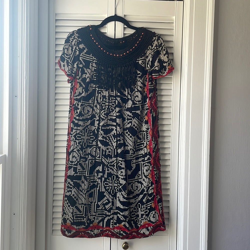 Anthropology fun dress with bold embroidery.